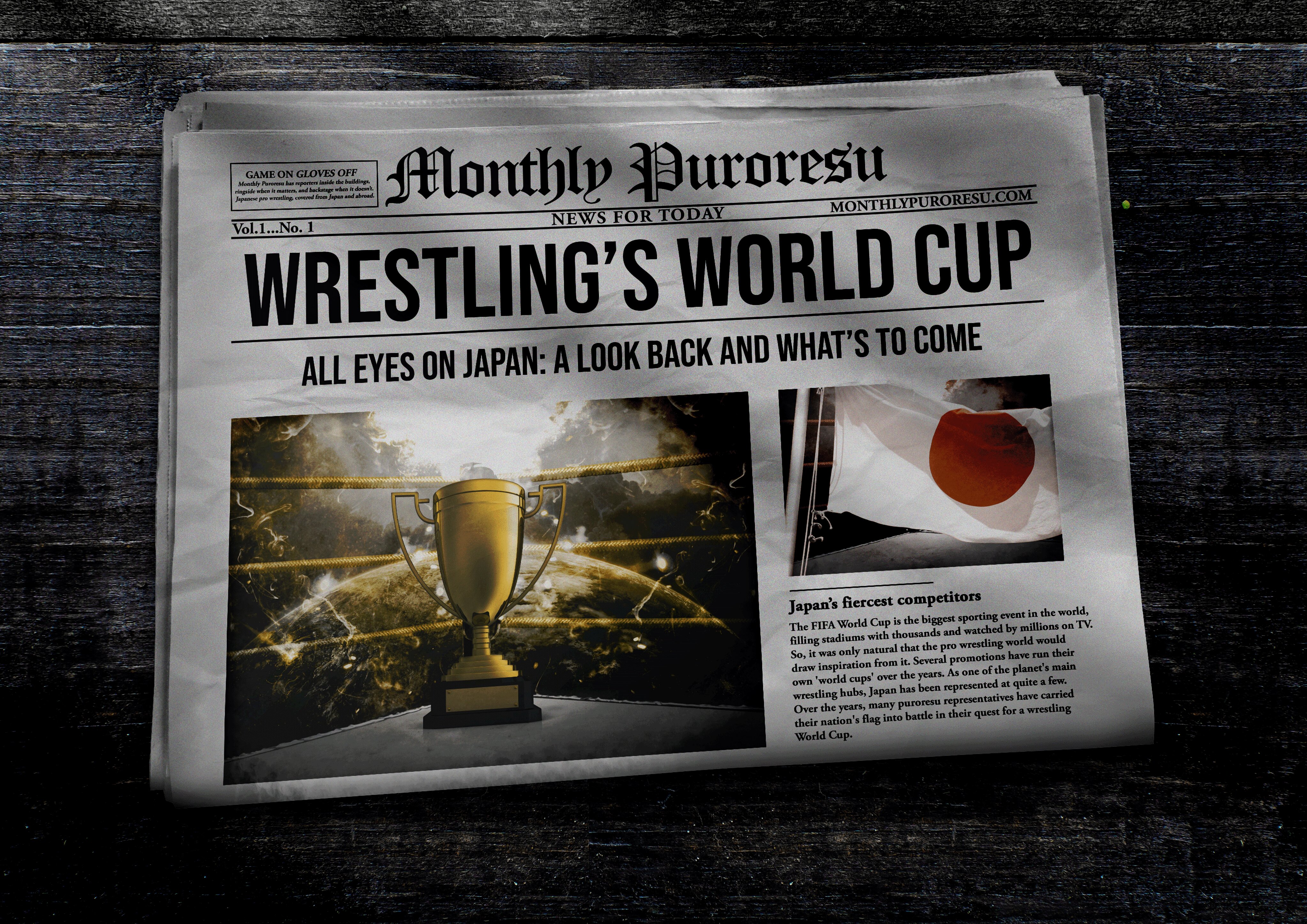 Newspaper front page with large 'WRESTLING'S WORLD CUP' headline and a gold trophy photo beneath on a dark wooden table, sports feature.