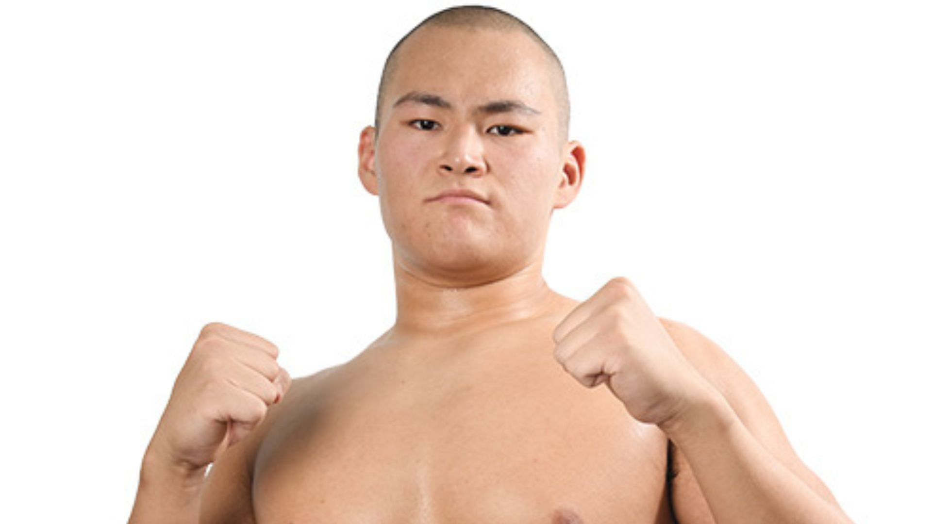 Shirtless man in a fighting stance with fists raised against a white background Refrain to ensure concise alt text